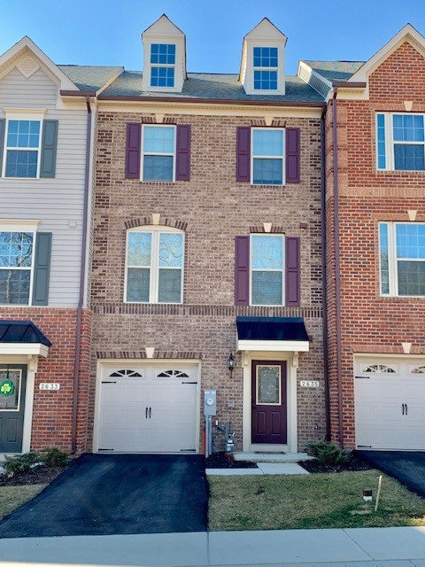 Gorgeous brick front 3bd 2/2bth townhouse w/1 car garage.