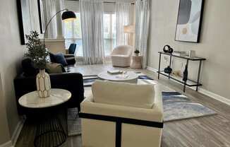 a living room with a couch and a chair