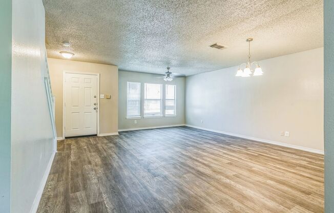 Spacious 4-Bedroom Home with Open Floor Plan & Brick Fireplace