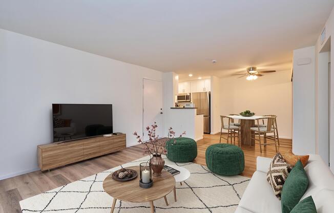 a living room filled with furniture and a fireplace