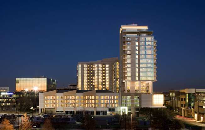 Apartments for Rent in Midtown Dallas TX - The Heights at Park Lane - Aerial View of the Exterior Building at Night