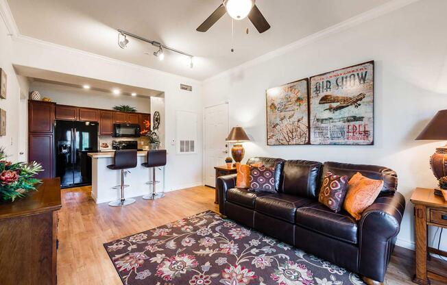 a living room filled with furniture and a fire place