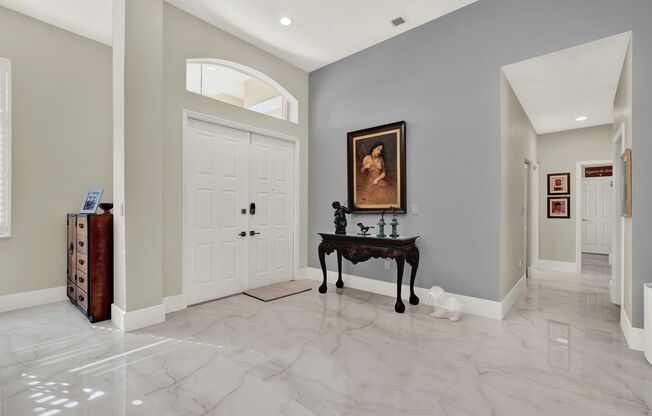Elegant 4-Bedroom Pool Home in Exclusive Gated Community