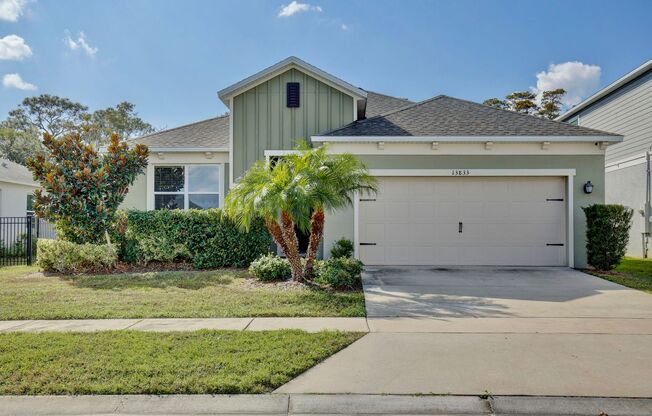 Gorgeous 4/3 Spacious Home with a 2 Car Garage Located on a Conservation Lot in Creekstone Neighborhood – Orlando!