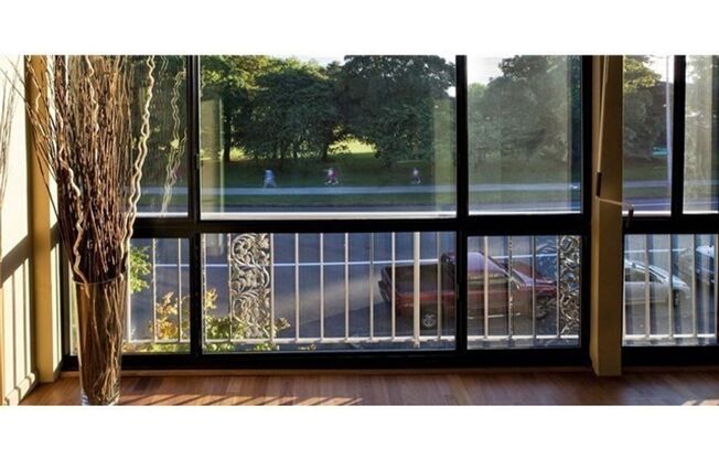 Green Lake Park Haven: Stunning 2-Bed Condo with Park Views, Parking, and More!
