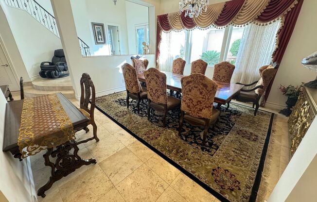 BEAUTIFUL FULLY FURNISHED 4 BEDROOM 4 BATHROOM 2 STORY HOME WITH A 3 CAR GARAGE