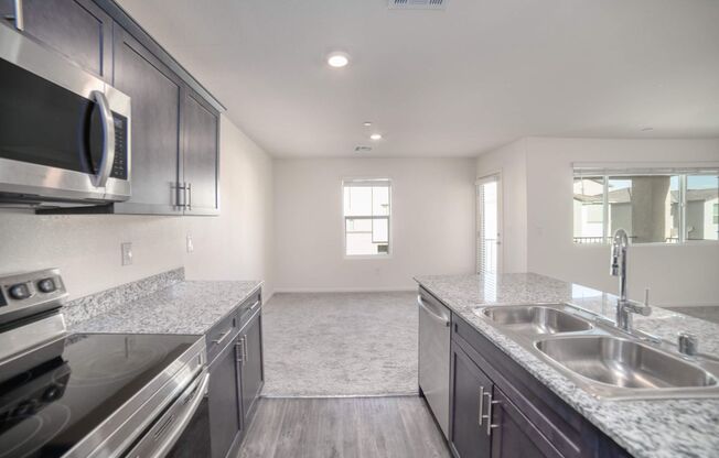 LOVELY 2-BEDROOM 2-BATH PLUS LOFT TOWNHOME IN SPECTACULAR GATED COMMUNITY!!