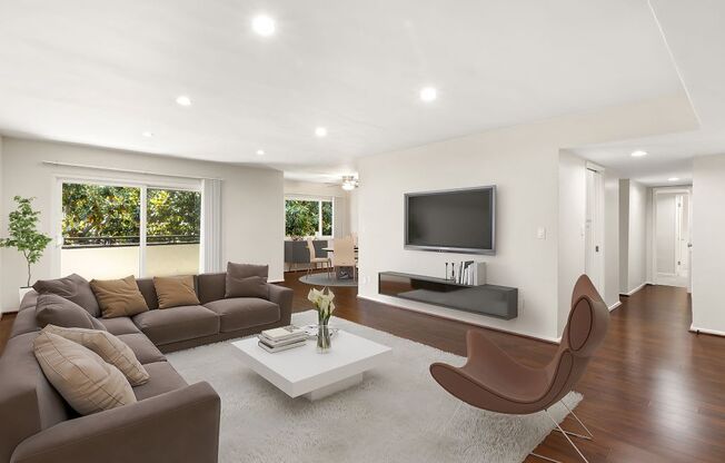 Living Room with Wood Floors and Recessed Lighting