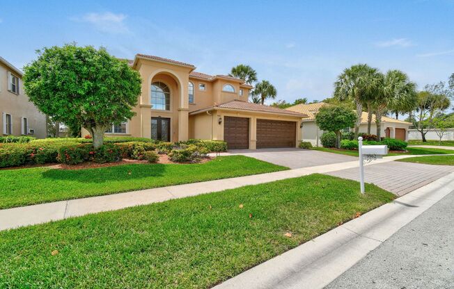 Discover the epitome of luxury living in this lakefront model home in Isola Bella Estates - one of the most prestigious Palm Beach community.