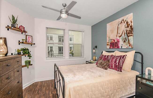 Bedroom with ceiling fan at The Foundry Luxury Apartments in Tampa FL