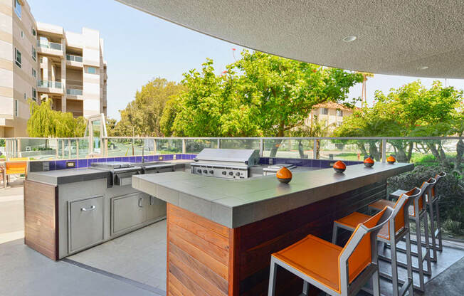 Poolside barbecue and wet bar  at Esprit Apartments, Marina del Rey, CA, 90292