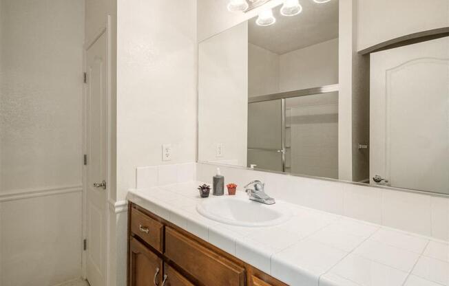 Renovated Bathrooms With Quartz Counters at Dartmouth Tower at Shaw, Clovis, CA, 93612