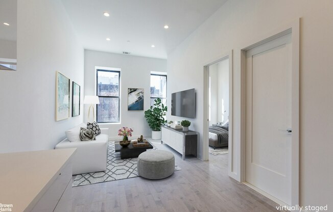 111 W 130 ST