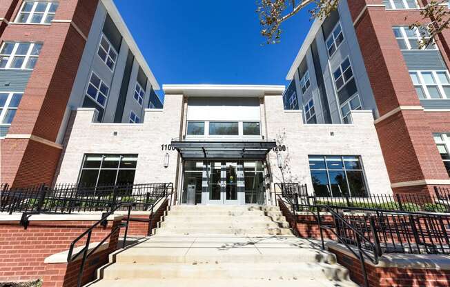 exterior of midrise apartment building at archer park apartments in southeast dc