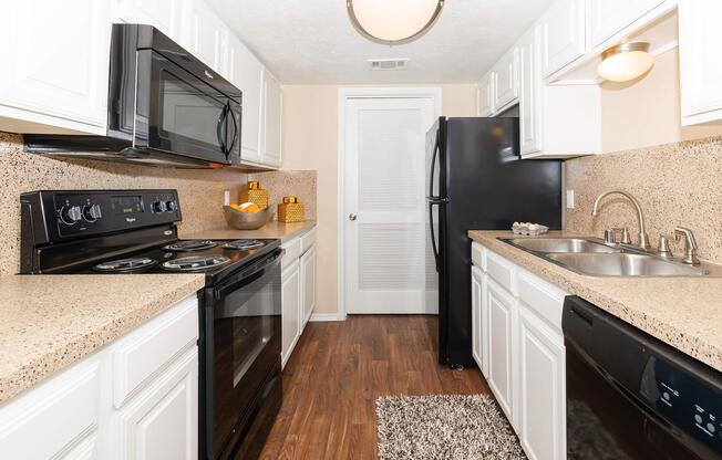 a modern kitchen with stainless steel appliances