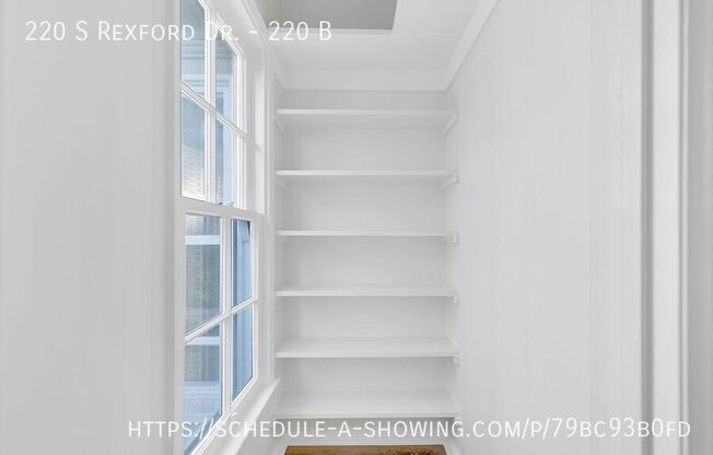 220 S REXFORD DR