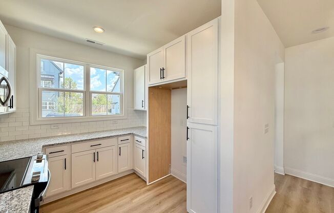 **OFFERING RENT PROMOTION FOR FIRST 6 MONTHS** Newly Built 4BD, 3.5BA End-Unit Raleigh Townhome in a Great Location
