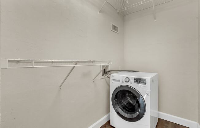 photo of a laundry room with a washer and dryer