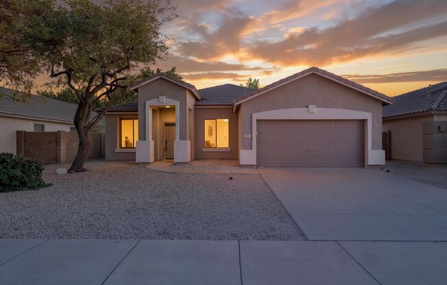 Absolutely beautiful 4 bedroom, 2 bathroom with 2 car garage in Dove Valley Ranch available for move in NOW!!  Backyard is a peaceful Oasis with Faux grass for easy care!!!  Close to TSMC!!!