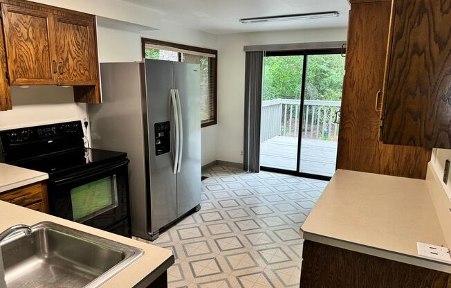 Large one level home with secluded backyard!