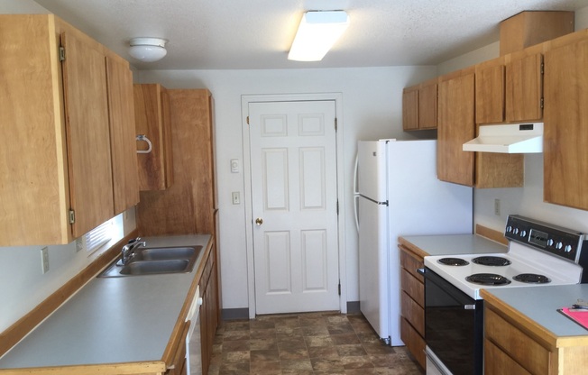 Quiet Eastside 3 Bdrm House, 2 Bath, All appliances in Kitchen, Attached Garage, Fenced Yard