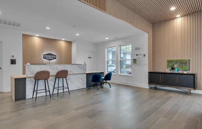 Step into modern living at Crossings @ 501 Apartments. This inviting lobby features stylish seating and contemporary design, perfect for welcoming guests or unwinding after a long day. Schedule a visit today and see it for yourself!