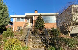 Gorgeous Mid Century Modern 3 bed, 1.5 bath in sought after Seaview neighborhood.