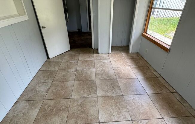 3BR/2BA Zephyrhills Home with 2 Sheds, Large Covered Front Porch