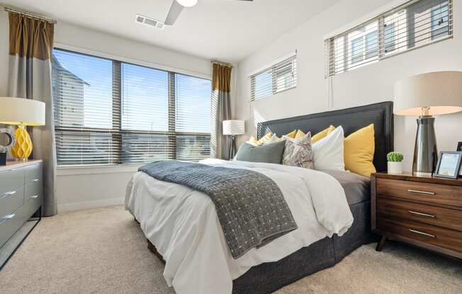 bedroom area of an apartment at ironridge at hill country village