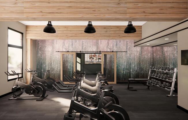 The fitness center at Modera Bridle Trails offers modern equipment and a welcoming setting for energizing workouts.