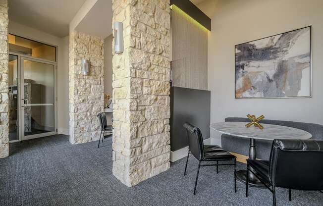 social area with conversation and work from home areas at The Allure apartments