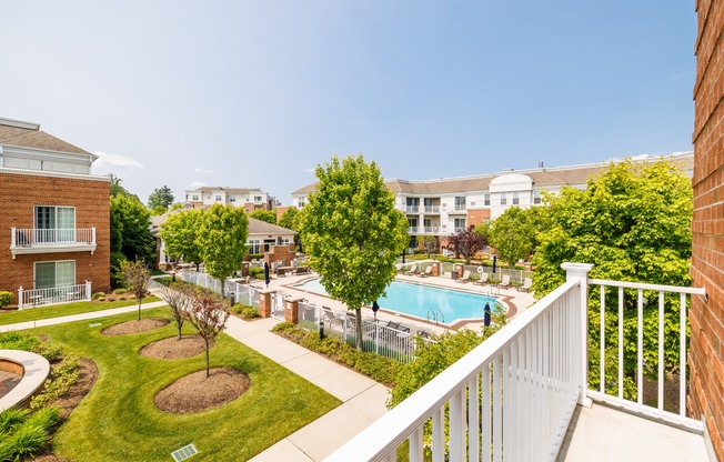 A view of a pool from a balcony.