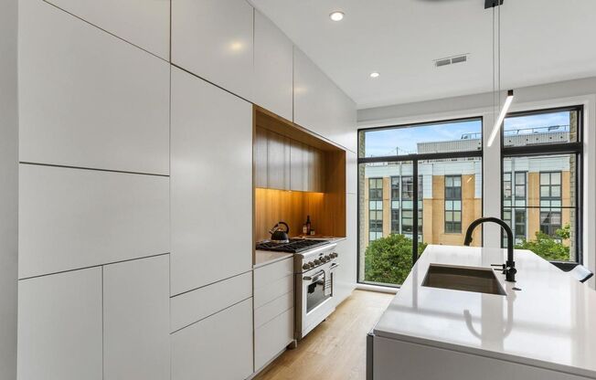 Sophisticated two-bedroom condo with ample sunlight and high end appliances