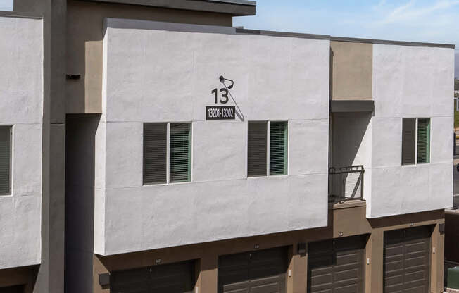 A modern building with the number 13 on it.