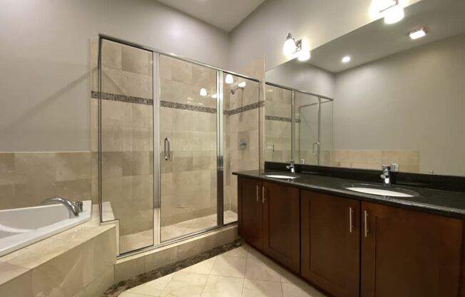 Bathroom with dual sinks, garden tub and walk-in shower - 3 Bedroom