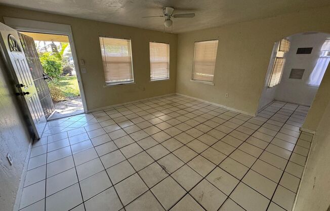 Large 4-1 house with car port and fenced backyard