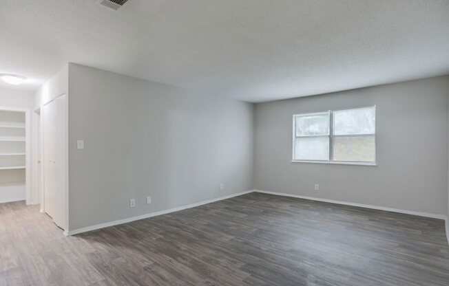 Macon, GA Apartment spacious bedroom with hardwood flooring