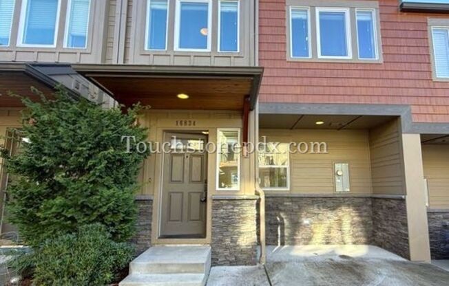 Modern Open Concept 3 Bedroom Home with Balcony and Attached Garage