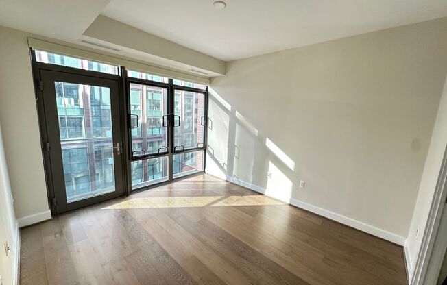 Stunning 2 bed (Primary bedroom + den w/closet), 2 bath condo located in the heart of downtown Bethesda.