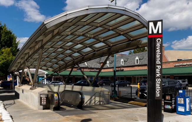 a gas station with a canopy over a parking lot