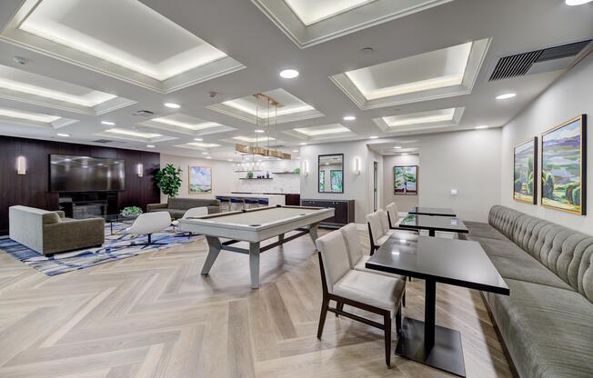 a room filled with furniture and a large window