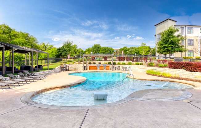 our apartments have a resort style pool with lounge chairs