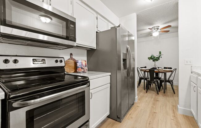 Cozy Modern 2-Bedroom Condo with Private Balcony & Fireplace