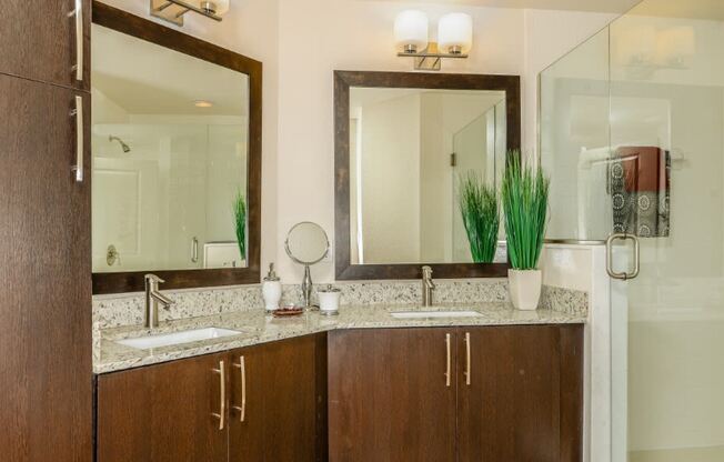 Bathroom with double sinks at Palm Ranch Apartments in Davie, FL