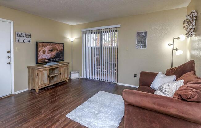 a living room filled with furniture and a fire place