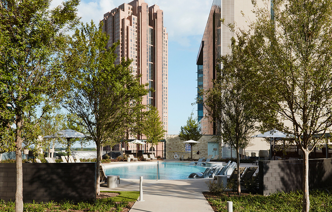 Outdoor pool and sundeck with cabanas