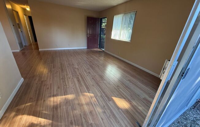 Spacious 2bd First Floor Condo W/Private Patio, Attached Garage, & Private Laundry Room