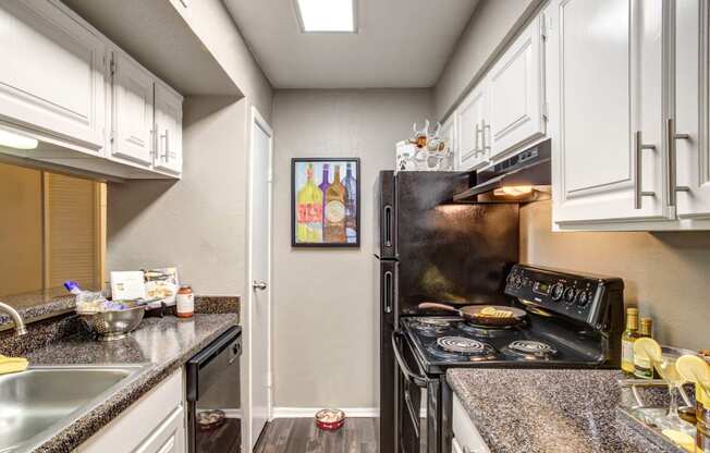 Fully Equipped Kitchen With Modern Appliances at 2400 Briarwest Apartments, Houston, TX, 77077