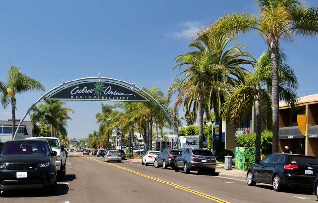 SURFER’S BEACH FLAT w/ IN UNIT LAUNDRY ! ..... tandem GARAGE !!!