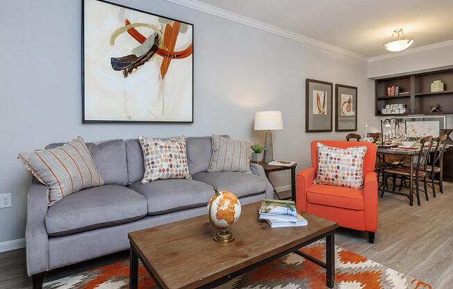 a living room filled with furniture and a fire place